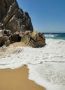 Ocean waves and picturesque rocks and on Divorce beach. Baja California Sur peninsula, Pacific Ocean, Mexico. Royalty Free Stock Photo