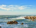 Ocean, waves and rocks on coast of beach in Malaysia for outdoor travel in summer for vacation or holiday. Sea