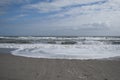 Sandy beach and waves, ocean shore