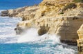 Ocean waves splash against beach with rocks background, Cliffs in the sea, Top aerial view of Cyprus, Nature Background with Sea,