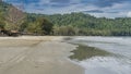 The ocean waves spread out on the sandy beach. Royalty Free Stock Photo