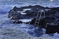 Ocean waves and stairs in public pool of Termas da Ferraria