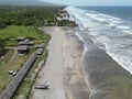 Ocean waves touching the coastline with the green beach view, Playa El Espino, Usulutan, El Salvador