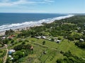 Ocean waves touching the coastline with the green beach view, Playa El Espino, Usulutan, El Salvador