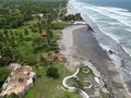 Ocean waves touching the coastline with the green beach view, Playa El Espino, Usulutan, El Salvador