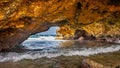 Ocean waves Under the Natural bridge formation in Aruba`s north coast