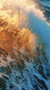 Ocean waves with white foam at sunset time. Blue and orange water splash in sea. Power and beauty of nature, wallpaper