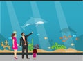 Oceanarium, a young family with children examines fish in the aquarium. The underwater world of the aquarium. Vector illustration Royalty Free Stock Photo