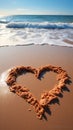 Oceanic affection Sandy heart on beach, with waves providing a scenic backdrop Royalty Free Stock Photo