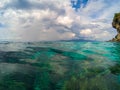 Oceanic landscape with transparent water and blue sky. Blue sea water look through.