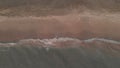 Oceanic slow motion aerial view of undertow at shore