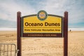 Oceano Dunes State Vehicular Recreation Area, a California State Park sign. Beach access