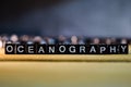 OCEANOGRAPHY concept wooden blocks on the table. Royalty Free Stock Photo