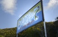 Oceans 7 Beach Club sign, Peter Island, BVI