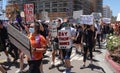 Oceanside, CA / USA - June 7, 2020: People hold signs during peaceful Black Lives Matter protest march Royalty Free Stock Photo