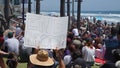 Oceanside, CA / USA - June 7, 2020: People hold signs during peaceful Black Lives Matter protest march Royalty Free Stock Photo