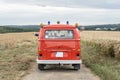 Ochtendung Germany 25.05.2019 Wedding Couple in Oldtimer VW T1 fire engine red firefigther car classic car drivin on the Road