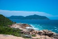 ocky coastline with turquoise-green water, green slopes and an absolutely blue sky Royalty Free Stock Photo