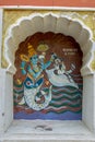 Matsyavtar or fish first incarnation of Lord Vishnu colourfully painted on wall of Vishnu Narayan temple at top of Parvati ; Pune