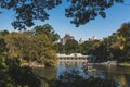 Locals rowing boats in a lake in central park, in a sunny autumn day Royalty Free Stock Photo