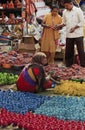 Unidentified vendor selling Diwali lamps and colorful pots at Kumbhar wada, Pune, India