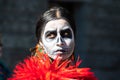 Oct 20, 2019 San Jose / CA / USA - Portrait of a woman with sugar-skull make-up, participating at Dia de Los Muertos Day of the Royalty Free Stock Photo