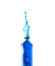 Octagon shaped glass bottle with water frozen with high speed flash photography