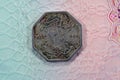 Octagonal old Egyptian coin of two and half 2ÃÂ½ milliemes series 1933 AD 1352 AH features king Fuad I of Egypt Royalty Free Stock Photo
