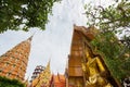 Octagonal pagoda,Chinese Pagoda,Vihara and large golden Buddha statue at Wat Tham SuaTiger Cave Temple,Tha Muang District,Kancha Royalty Free Stock Photo