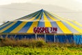 October 2022 - Abbotsford, Canada: A tent erected for nightly Christian gospel services sits in a farm field.