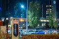 October 20, 2022 Astana, Kazakhstan: Empty Tesla electric car charging station against the backdrop of the city at night Royalty Free Stock Photo