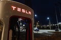 October 20, 2022 Astana, Kazakhstan: Empty Tesla electric car charging station against the backdrop of the city at night Royalty Free Stock Photo