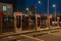 October 20, 2022 Astana, Kazakhstan: Empty Tesla electric car charging station against the backdrop of the city at night Royalty Free Stock Photo