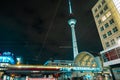 October 2021 - Berlin, Germany. Alexanderplatz with famous TV Television - Fernsehturm tower at night. Panoramic Royalty Free Stock Photo