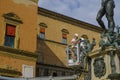 October 2021 Bologna, Italy: Workers cleaning the Neptune Fountain across the buildings on the square, piazza Maggiore Royalty Free Stock Photo