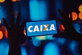 October 11, 2022, Brazil. In this photo illustration, the Caixa EconÃÂ´mica Federal CEF logo is displayed on a smartphone screen
