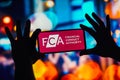 October 5, 2022, Brazil. In this photo illustration, the Financial Conduct Authority FCA logo is seen displayed on a smartphone Royalty Free Stock Photo