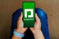 October 16, 2023, Brazil. In this photo illustration, the Paycom logo is displayed on a smartphone screen Royalty Free Stock Photo