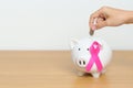 October Breast Cancer Awareness month, Pink Ribbon with Piggy Bank for support illness life. Health, Donation, Charity, Campaign, Royalty Free Stock Photo