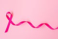 October Breast Cancer Awareness month, Pink Ribbon on pink background for supporting people living and illness. International