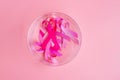 October Breast Cancer Awareness month, Pink Ribbon on pink background for supporting people living and illness. International