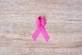 October Breast Cancer Awareness month, Pink Ribbon on wood background for supporting people living and illness. Healthcare, Royalty Free Stock Photo