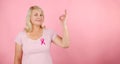 October Breast Cancer Awareness month, Woman in pink T- shirt with Pink Ribbon for supporting people living and illness Royalty Free Stock Photo