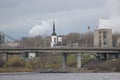 October bridge in the city of Cherepovets, Vologda Oblast, against the backdrop of a cloudy autumn sky Royalty Free Stock Photo