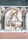 October, detail of the bass-relief representing the Labor of the months of the year, Cathedral in Lucca, Italy