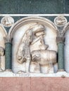 October, detail of the bass-relief representing the Labor of the months of the year, Cathedral in Lucca, Italy