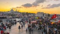 October 27, 2019. Eminonu square by sunset, Istanbul, in Turkey. People rest and socialize in a square near Galata Bridge,