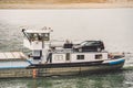 27 October 2018 Germany, Dusseldorf. North Rhine. Cargo ship, barge goes along the North Rhine river. Theme freight transport by Royalty Free Stock Photo