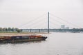 27 October 2018 Germany, Dusseldorf. North Rhine. Cargo ship, barge goes along the North Rhine river. Theme freight transport by Royalty Free Stock Photo