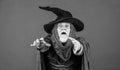 31 october. gothic man in Halloween costume. Magic concept. Experienced and wise. Wizard costume hat Halloween party